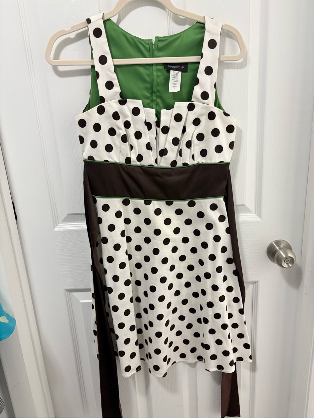 White Polka Dot Sleeveless Dress with Brown Waistband and Green Lining